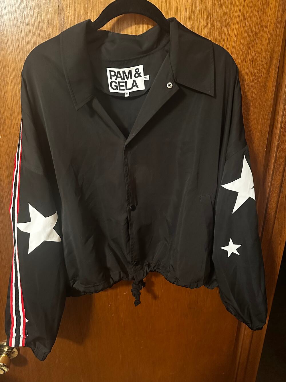 PAM & GELA BLACK STARS AND STRIPES JACKET; SIZE M/L